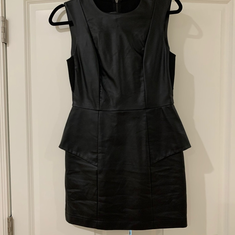 “Leather” peplum black dress